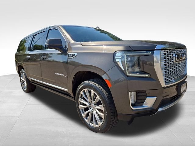 2021 GMC Yukon XL Denali in Smokey Quartz Metallic — front three-quarter view