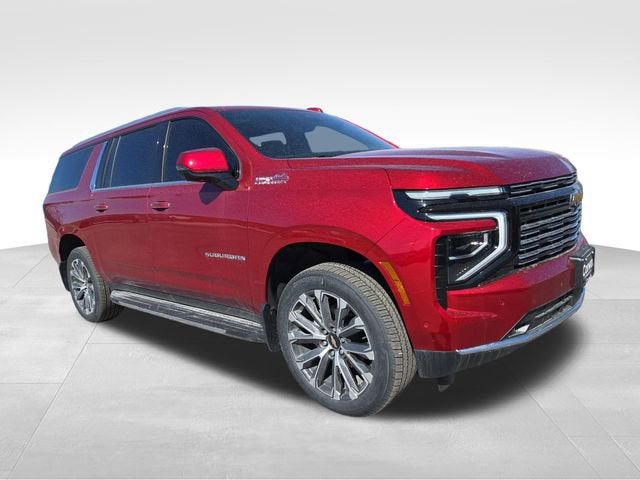 2026 Chevrolet Suburban High Country in Radiant Red Tintcoat — front three-quarter view