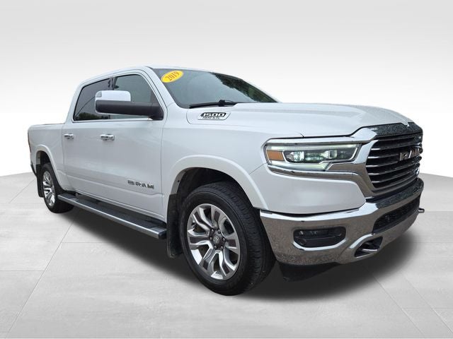 2019 RAM 1500 Laramie Longhorn in Ivory White Tri-Coat Pearlcoat — front three-quarter view